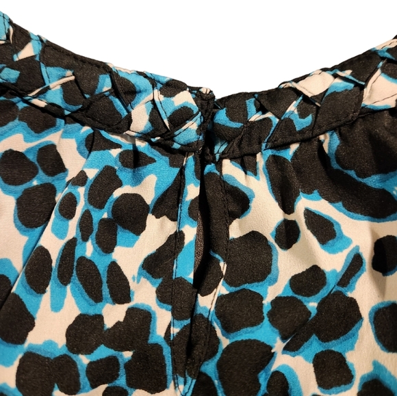 Animal Print Ruffle Sleeveless Blouse - Picture 4 of 5